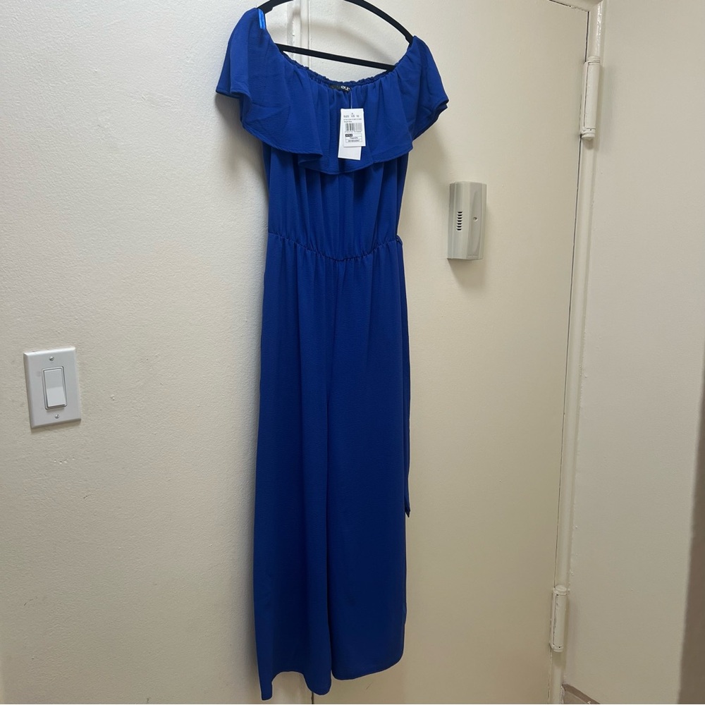 Royal Blue Jumpsuit, never worn, still with tags! Size 10.